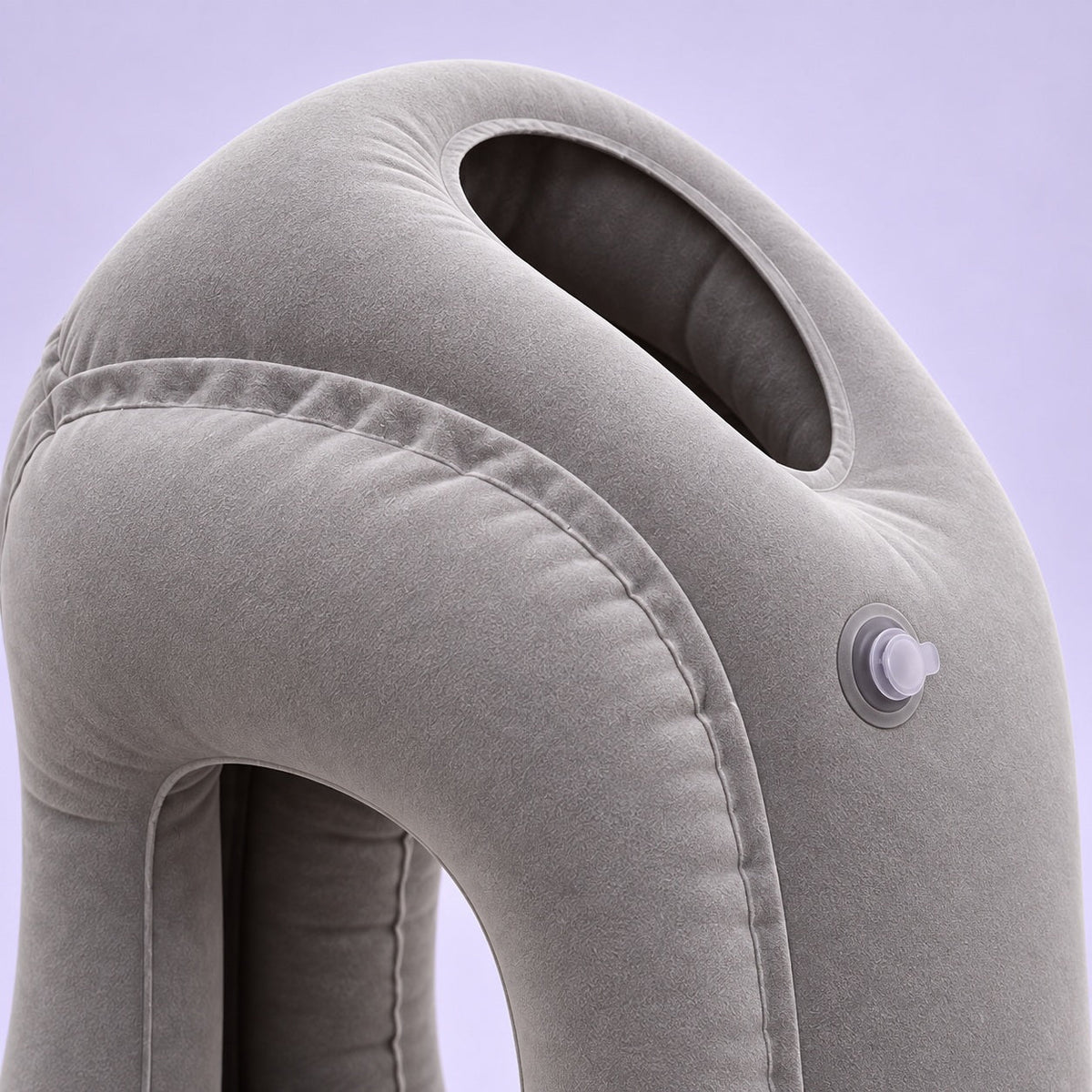 Close view of the gray pillow upper cushion, oval opening and side valve